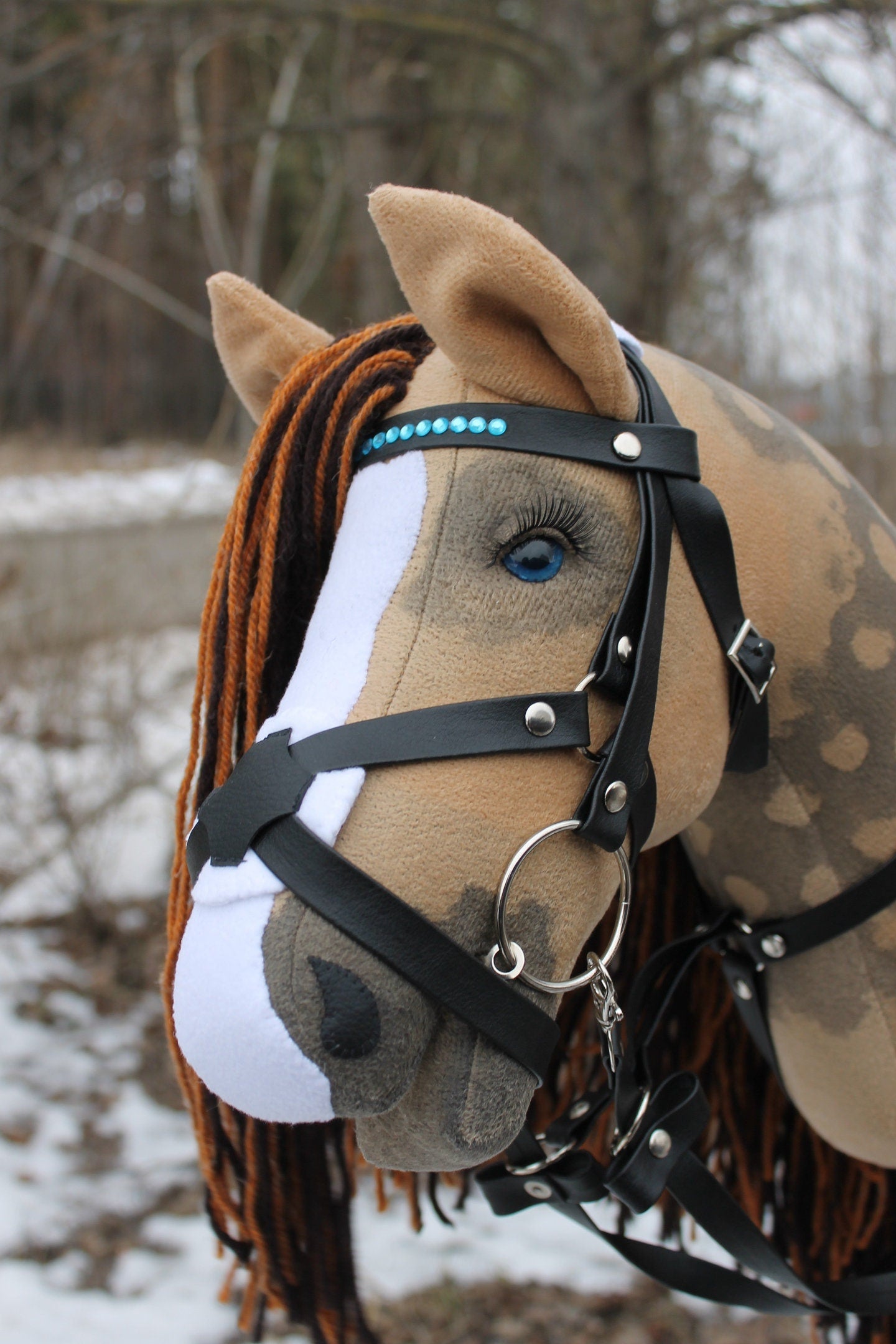 Hobbyhorse with bridle A3 Palomino ORLEANS with heterochromia (blue/brown)