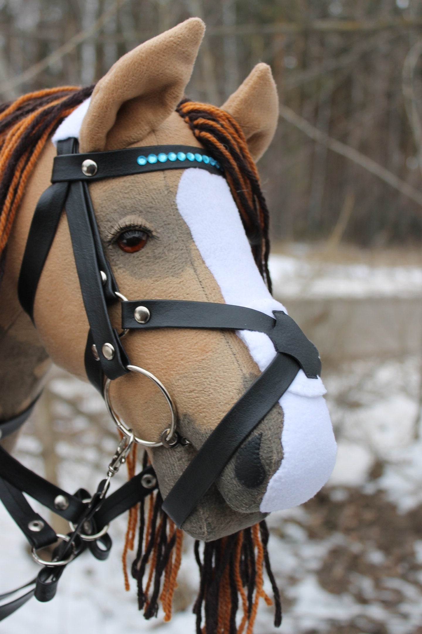 Hobbyhorse with bridle A3 Palomino ORLEANS with heterochromia (blue/brown)